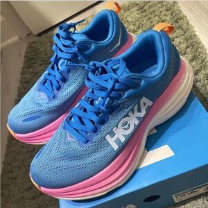 Hoka Women’s Blue Running Shoes with Pink & Orange Accents